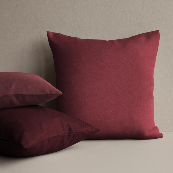 Rotschwarzer Gardinenstoff im Uni-Design liegt gefaltet auf einer Oberfläche. Der Stoff zeigt eine gleichmäßige Textur und intensive Farbe. Er eignet sich für individuelle Maßanfertigungen.