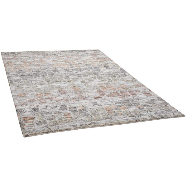 Farbenfroher Teppich Lhasa aus tibetanischer Schurwolle in verschiedenen Farben mit einer strukturierten Oberfläche. Er wird als dekoratives Element für Räume angeboten.