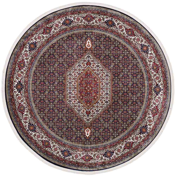 Klassischer Bidjar Teppich in rot mit kunstvollen floralen Mustern. Der Teppich zeigt eine zentrale Medaille und verleiht jedem Raum Eleganz. Durchmesser: 160 cm.