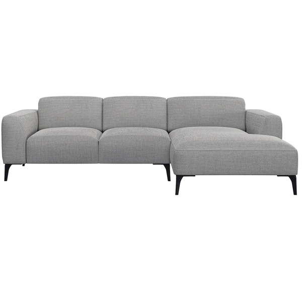 Beige Chaiselongue-Sofa mit klaren Linien und niedrigem Rücken, bestehend aus strapazierfähigem Material. Es bietet eine geräumige Liegefläche und elegante, schwarze Beine.