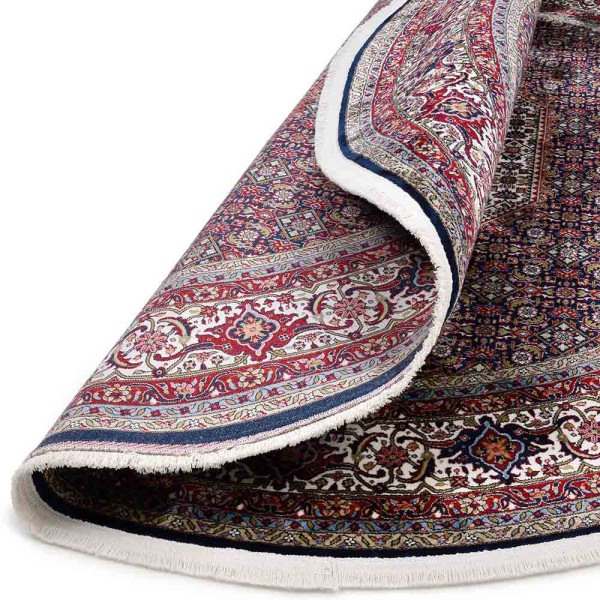 Klassischer Bidjar Teppich in rot mit kunstvollen floralen Mustern. Der Teppich zeigt eine zentrale Medaille und verleiht jedem Raum Eleganz. Durchmesser: 160 cm.