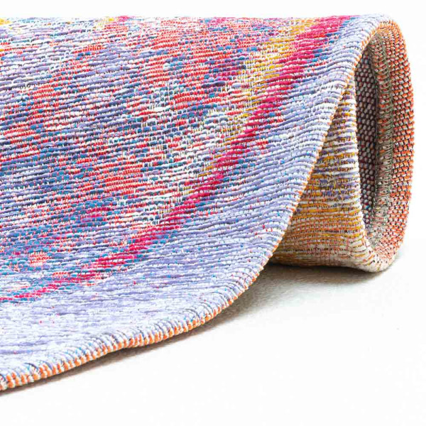 Bunter Teppich Keitum SA013 mit strukturiertem Design in Farbtönen von Orange, Blau und Rot. Er ist rund und zeigt abstrakte Formen, die harmonisch miteinander verbunden sind.