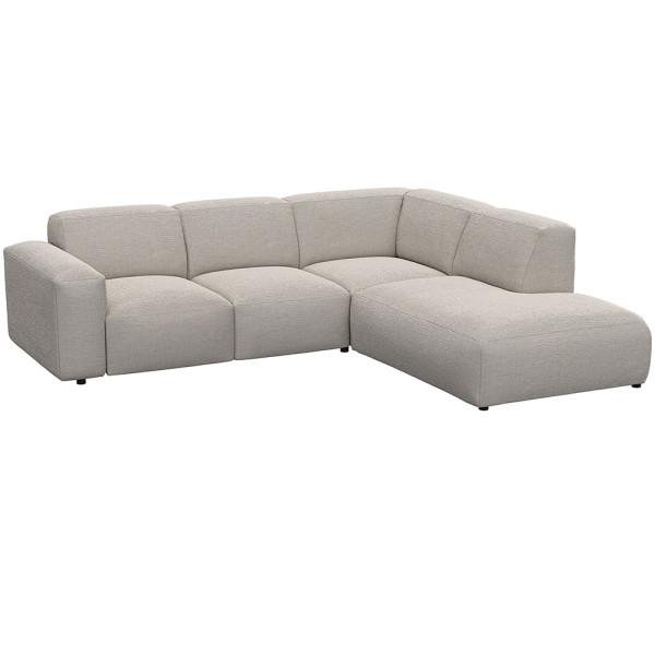 Graues, modulares Sofa LUCERA mit offener Ecke steht dekorativ. Es bietet bequeme Sitzmöglichkeiten und passt sich dem Raumdesign an. Ideal für eine stilvolle Inneneinrichtung.