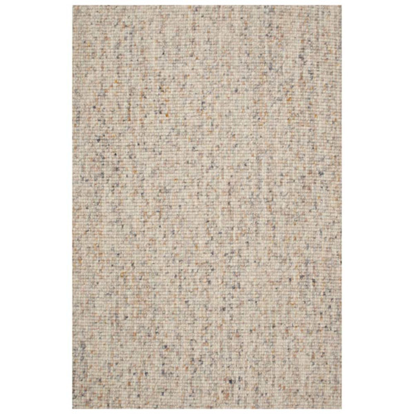 Zarter Webteppich in Beige, bestehend aus Schurwolle. Die strukturierte Oberfläche zeigt kleine, runde Muster und verleiht dem Raum eine gemütliche Atmosphäre. Ideal für nachhaltige Einrichtungsstile.