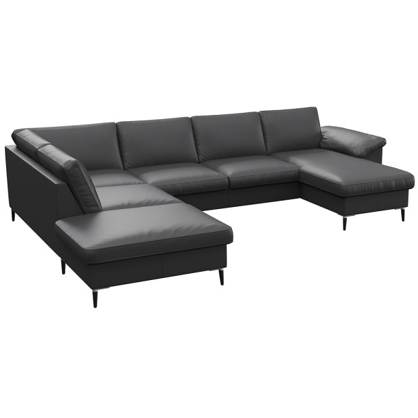 Gemütliches Ecksofa in einem gedeckten Grünton mit breiten Armlehnen. Das Sofa bietet viel Platz und ist ideal für entspannte Stunden im Wohnzimmer.