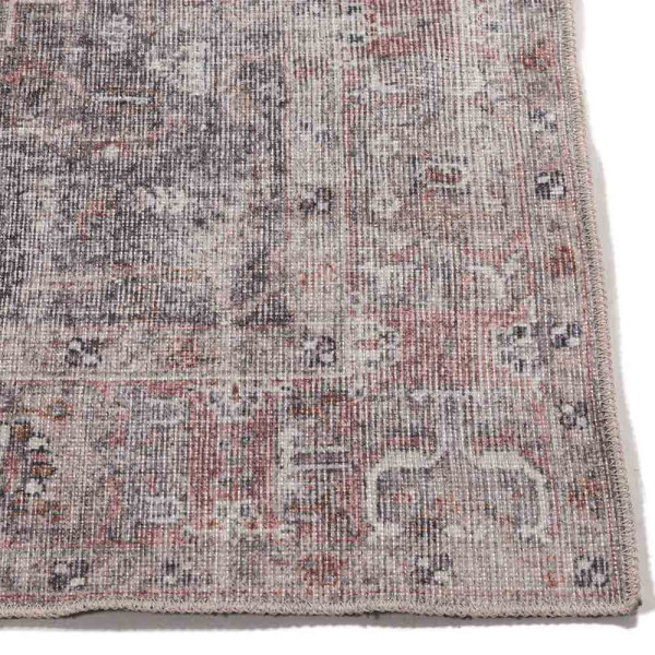 Moderner Orientteppich Aquamarijn mit Kurzflor. Der Teppich zeigt ein farbenfrohes, geometrisches Muster. Er eignet sich als dekoratives Element in verschiedenen Wohnräumen.