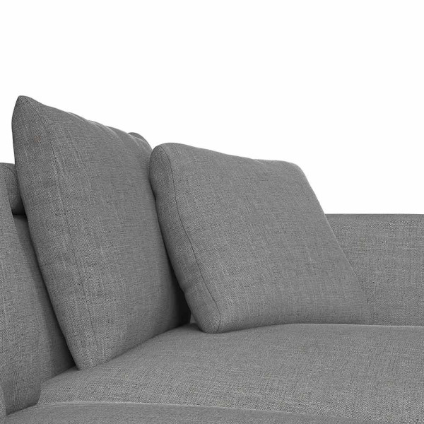Helles, modernes Sofa in hellbeiger Farbe mit zwei Kissen. Es hat eine schlichte, rechteckige Form und steht auf schwarzen Beinen. Die Oberfläche wirkt einladend und bequem.