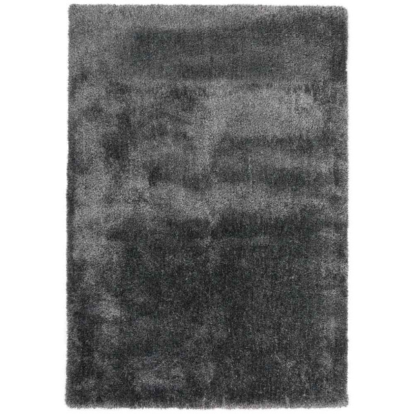Dunkelgrauer Hochflor-Teppich Lago Mix liegt auf einem Untergrund. Der Teppich wirkt flauschig und weich, ideal für Wohnräume und bietet eine angenehme Fußwärme.