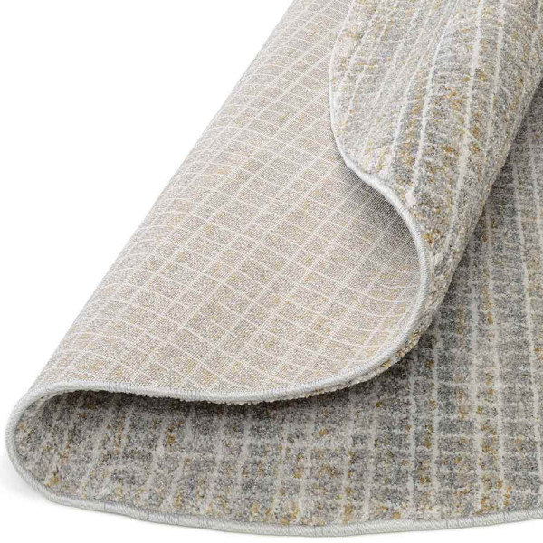 Heller karierter Hochflor-Teppich in grau-cremefarben mit gleichmäßiger Geometrie ist rund. Er kann in verschiedenen Größen wie 120 cm Durchmesser oder 200 x 200 cm bestellt werden.