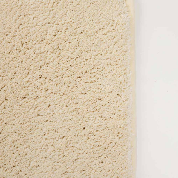 Beige Teppich mit kurzem Flor weist eine strukturierte Oberfläche auf. Er eignet sich für individuelle Raumgestaltungen und ist in verschiedenen Farben erhältlich. Lieferung innerhalb von 21 Tagen.