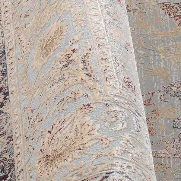 Grauer Kurzflorteppich mit multicolor Design zeigt florale Muster in sanften Farben. Vorteilhaft für eine stilvolle Raumgestaltung, bietet er Komfort und Ästhetik in jedem Wohnambiente.