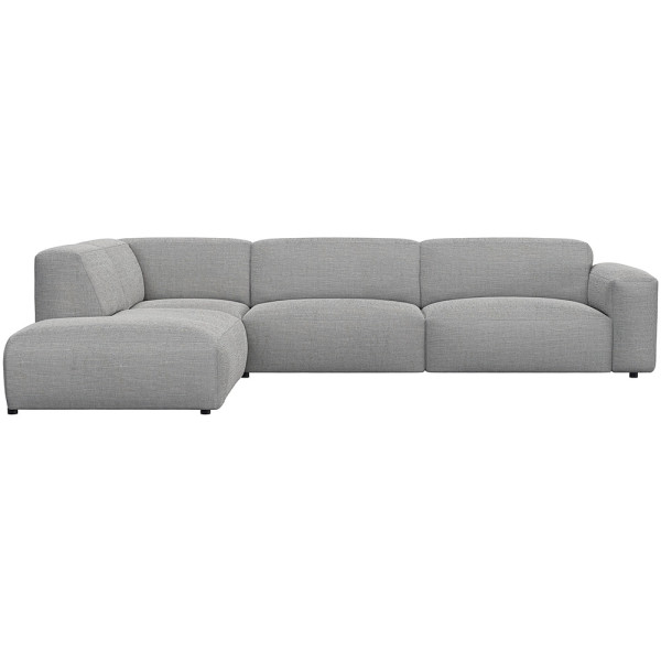 Graues, modulares Sofa LUCERA mit offener Ecke steht dekorativ. Es bietet bequeme Sitzmöglichkeiten und passt sich dem Raumdesign an. Ideal für eine stilvolle Inneneinrichtung.