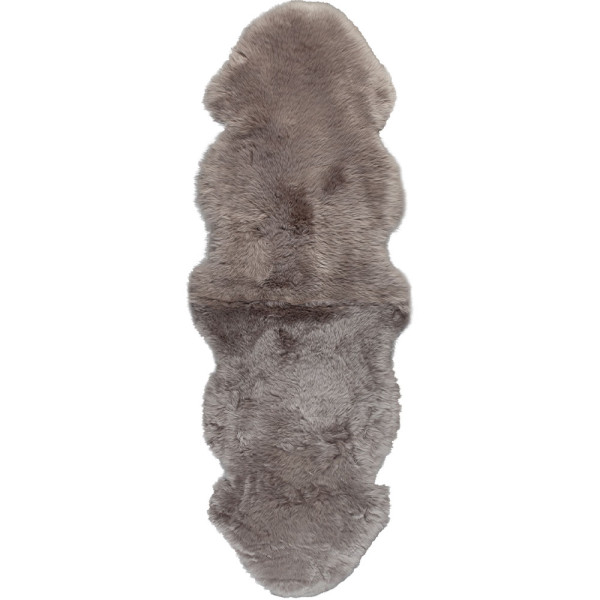 Doppeltes Lammfell in der Farbe Natur liegt flach auf einer Oberfläche. Die Oberfläche ist weich und pelzig, mit einer länglichen Form von 50 x 160 cm.