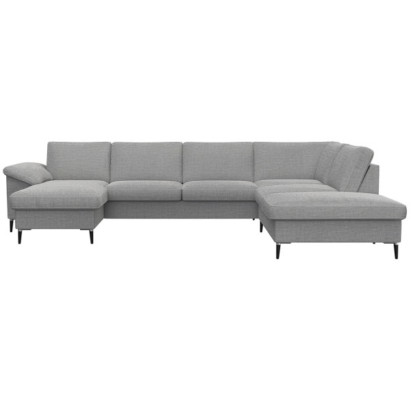 Gemütliches Ecksofa in einem gedeckten Grünton mit breiten Armlehnen. Das Sofa bietet viel Platz und ist ideal für entspannte Stunden im Wohnzimmer.
