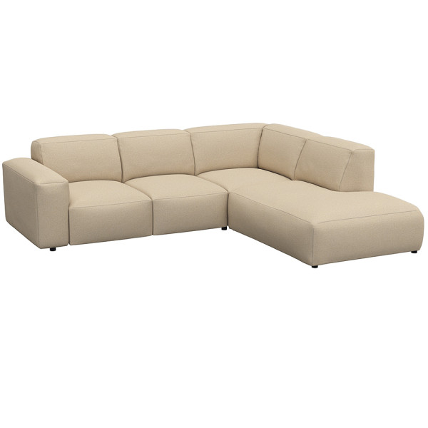 Graues, modulares Sofa LUCERA mit offener Ecke steht dekorativ. Es bietet bequeme Sitzmöglichkeiten und passt sich dem Raumdesign an. Ideal für eine stilvolle Inneneinrichtung.