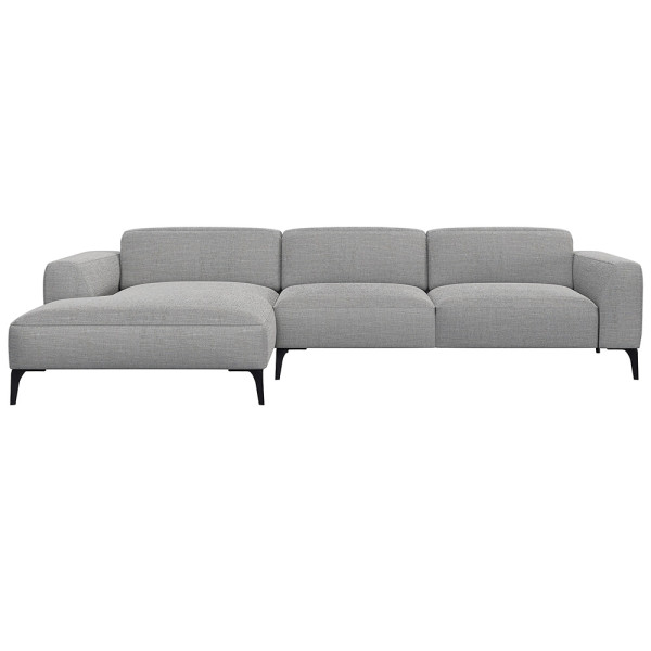 Beige Chaiselongue-Sofa mit klaren Linien und niedrigem Rücken, bestehend aus strapazierfähigem Material. Es bietet eine geräumige Liegefläche und elegante, schwarze Beine.