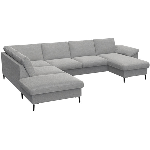 Gemütliches Ecksofa in einem gedeckten Grünton mit breiten Armlehnen. Das Sofa bietet viel Platz und ist ideal für entspannte Stunden im Wohnzimmer.