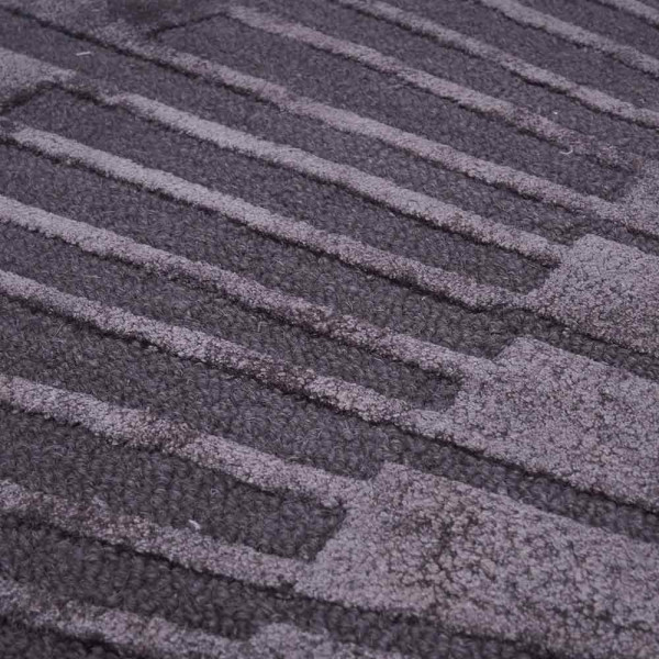 Runder Teppich im Strahlen-Design, gefertigt in Hoch-Tief-Optik. Er hat einen Durchmesser von 200 cm und ist in grauer Farbe erhältlich. Der Preis beträgt 799,00 €.