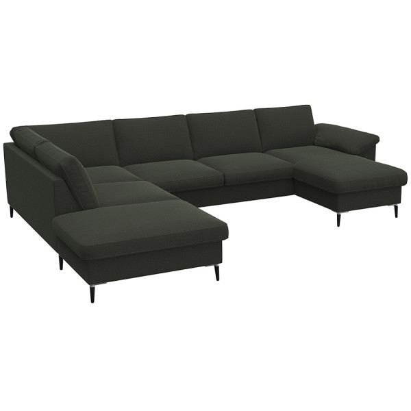 Gemütliches Ecksofa in einem gedeckten Grünton mit breiten Armlehnen. Das Sofa bietet viel Platz und ist ideal für entspannte Stunden im Wohnzimmer.
