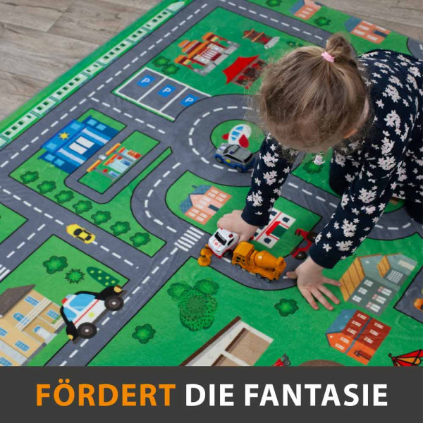 Spielteppich mit bunten Motiven einer Stadt, Straßen, Fahrzeugen und Spielplätzen, die Kindern das Spielen und Entdecken ermöglichen.