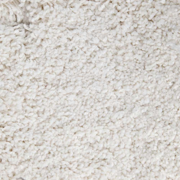 Weißer, hochfloriger Teppich mit samtiger Oberfläche liegt flach auf dem Boden. Die Struktur zeigt weiche, dichte Fasern. Der Teppich eignet sich für individuelle Maßanfertigung und ist in verschiedenen Farben erhältlich.