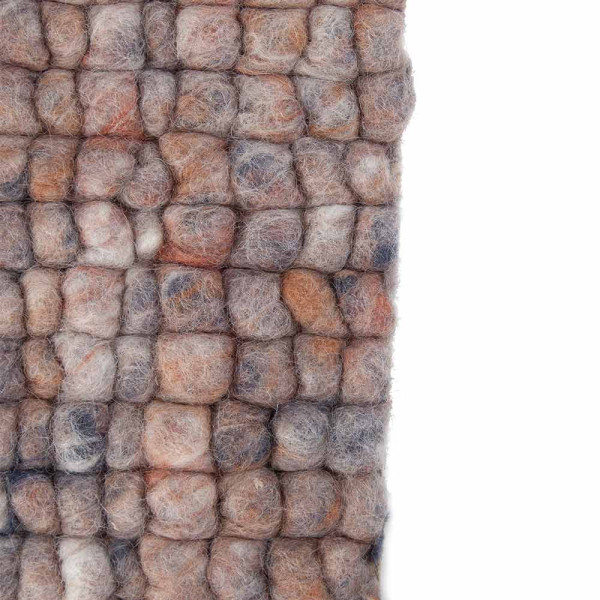 Heller, nachhaltiger Webteppich aus Schurwolle mit strukturierter Oberfläche in sanften Beige- und Grautönen. Er eignet sich für individuelle Gestaltung und Maßanfertigungen.
