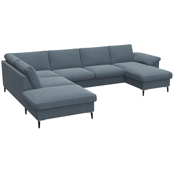 Gemütliches Ecksofa in einem gedeckten Grünton mit breiten Armlehnen. Das Sofa bietet viel Platz und ist ideal für entspannte Stunden im Wohnzimmer.