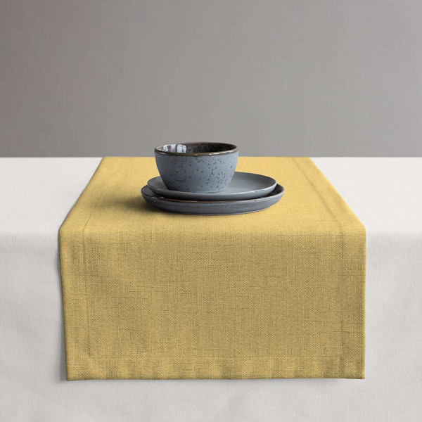 Gelber Gardinenstoff aus der Restill-Kollektion ist glatt und gut strukturiert. Der Stoff zieht sich sanft über den Untergrund und eignet sich für individuelle Anpassungen.