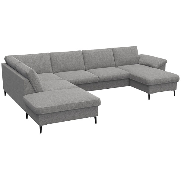 Gemütliches Ecksofa in einem gedeckten Grünton mit breiten Armlehnen. Das Sofa bietet viel Platz und ist ideal für entspannte Stunden im Wohnzimmer.
