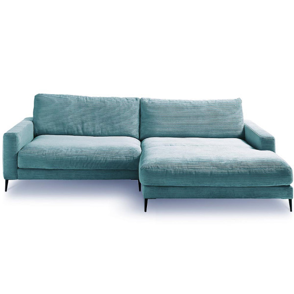 Cordsofa Uptown ST2 in petrol mit einer Chaiselongue auf der rechten Seite steht auf vier schwarzen Füßen. Es hat einen strukturierten Bezug und bietet Platz für mehrere Personen.