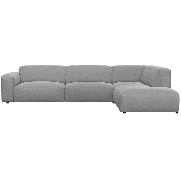 Graues, modulares Sofa LUCERA mit offener Ecke steht dekorativ. Es bietet bequeme Sitzmöglichkeiten und passt sich dem Raumdesign an. Ideal für eine stilvolle Inneneinrichtung.