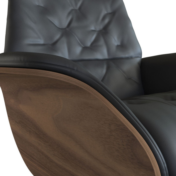 Relaxsessel Volden in schwarz mit Holz-Korpus und einem gepolsterten, hohen Rückenteil. Der Sessel bietet Komfort und Stil für verschiedene Wohnräume.