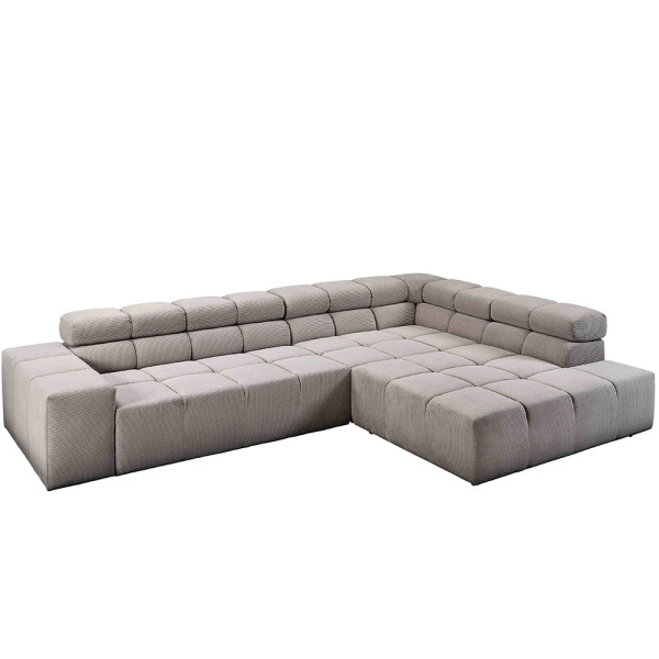 Ecksofa aus feincord in neutralen Farben, mit quaderförmigen Polstern und einer modernen, geradlinigen Form. Das Sofa bietet großzügigen Sitzplatz für mehrere Personen.