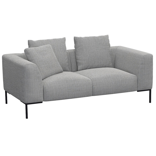Helles, modernes Sofa in hellbeiger Farbe mit zwei Kissen. Es hat eine schlichte, rechteckige Form und steht auf schwarzen Beinen. Die Oberfläche wirkt einladend und bequem.