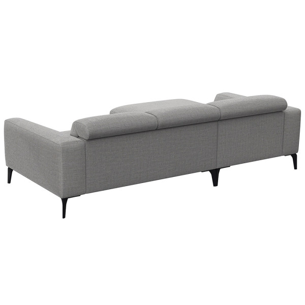 Beige Chaiselongue-Sofa mit klaren Linien und niedrigem Rücken, bestehend aus strapazierfähigem Material. Es bietet eine geräumige Liegefläche und elegante, schwarze Beine.